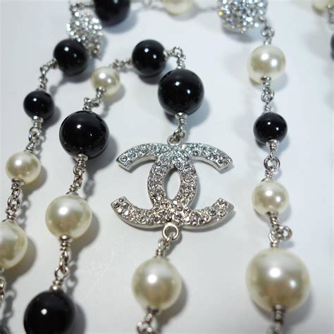 chanel pink white and black|Chanel black and white necklace.